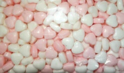 Compressed Candy - Pink And White Hearts (1kg Bag) -AU Snack Sales Store Compressed candy pink and white hearts close up 26186.1450418125