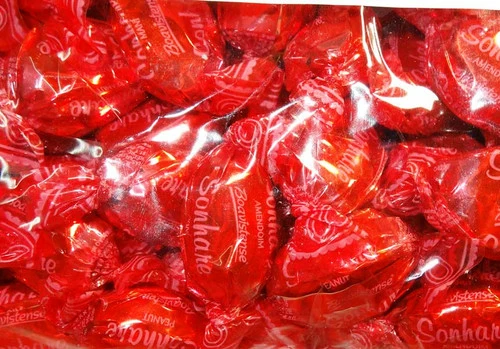 Sweet Treats Wrapped Hard Toffees - Red - Peanut (1kg) 1 Sweet Treats Wrapped Hard Toffees - Red - Peanut (1kg)